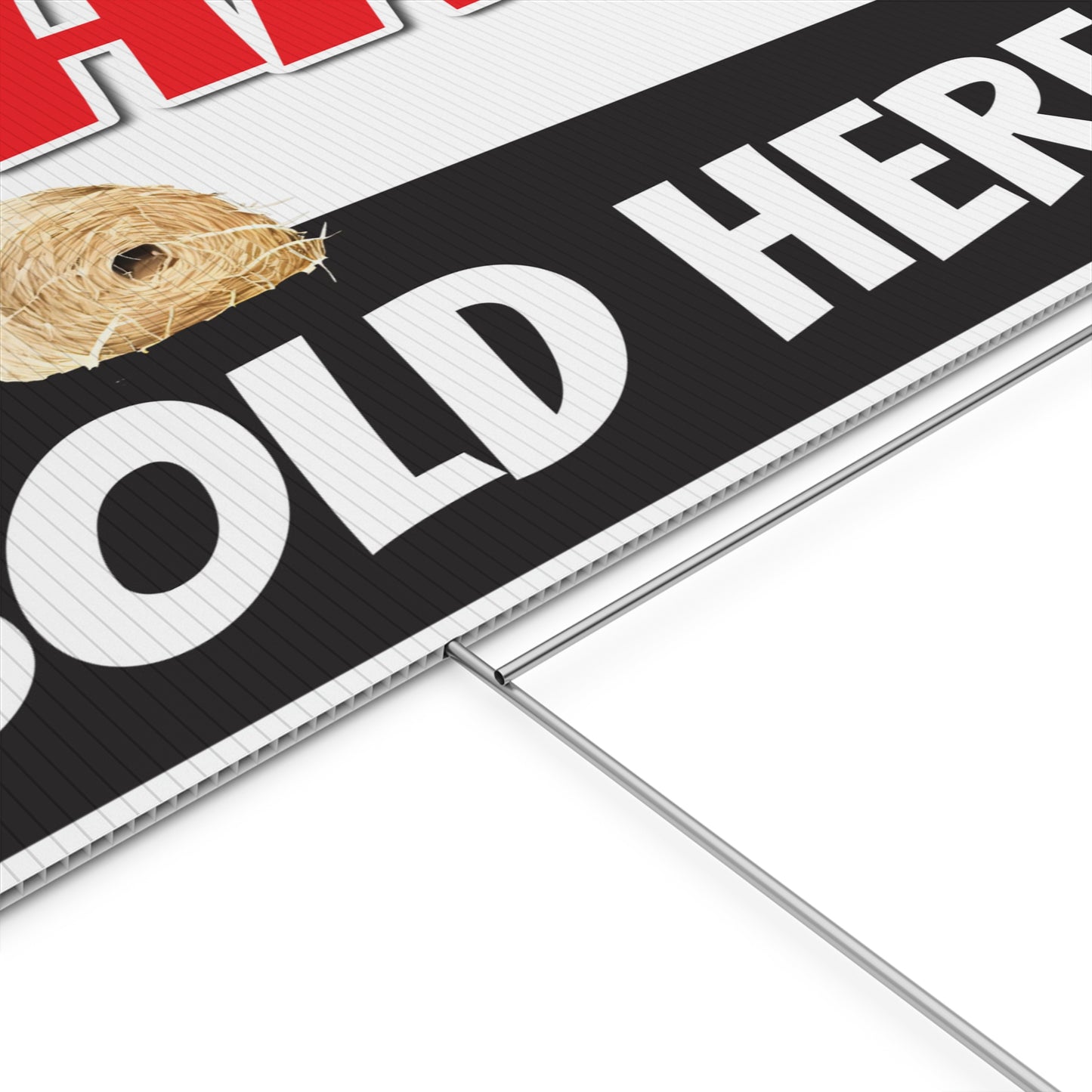 Hay sign with 'Hay Sold Here' text on a white background and haystacks