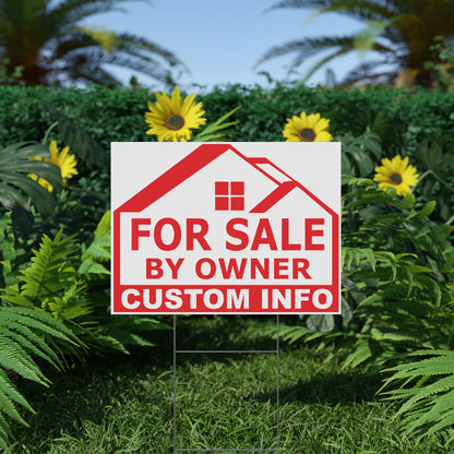 For Sale by Owner sign in a garden with greenery and flowers.